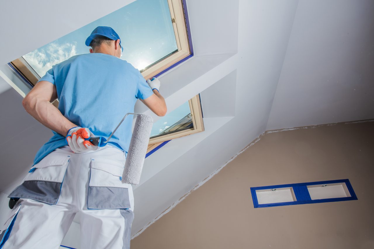 men painting apartment e1698216505484